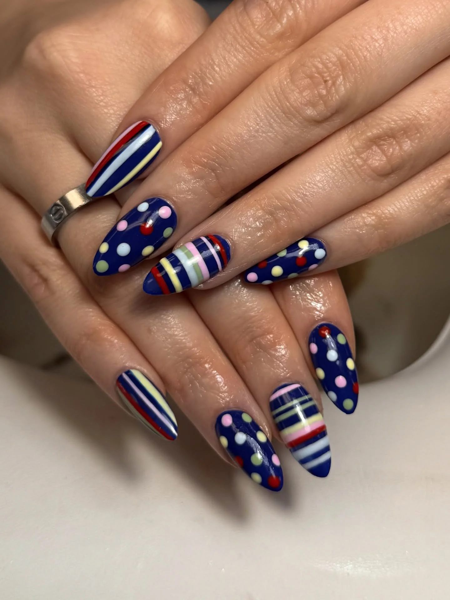 Stripes AND polka dots? Yes please. @emlovesnailies with the Gel-X magic.