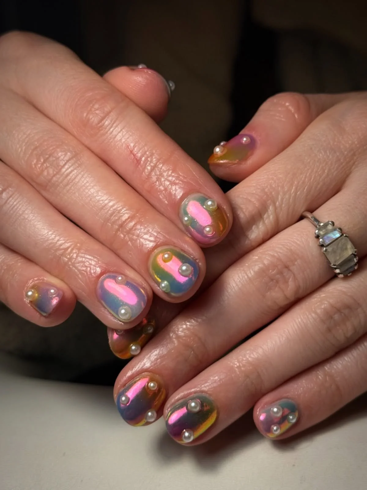 Aura and chrome magic by @tlynnes_nails