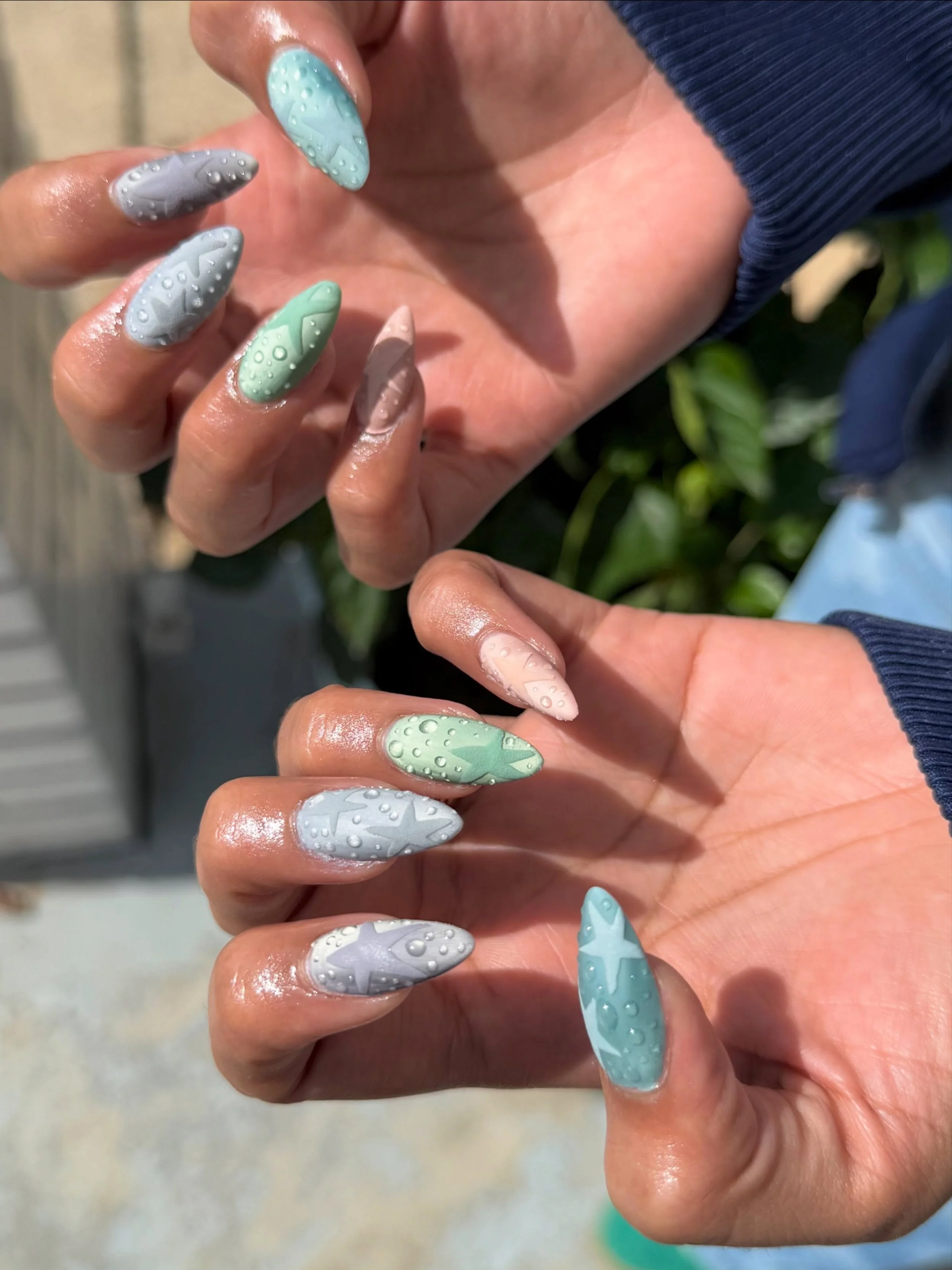 Birthday nails for bae. It hasn&rsquo;t stopped raining her in like 72 days so her nails might as well have lil rain drops too.
