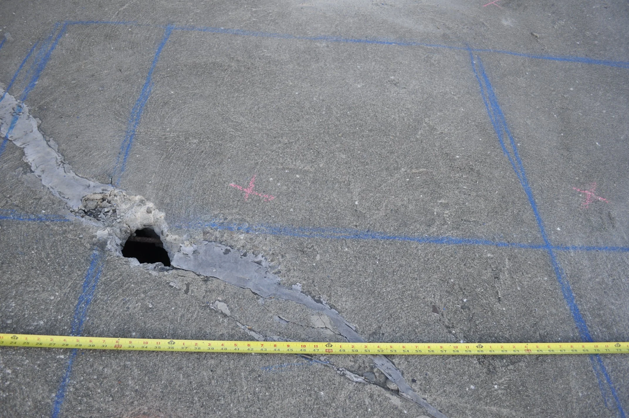 Marked testing grid with surface spall