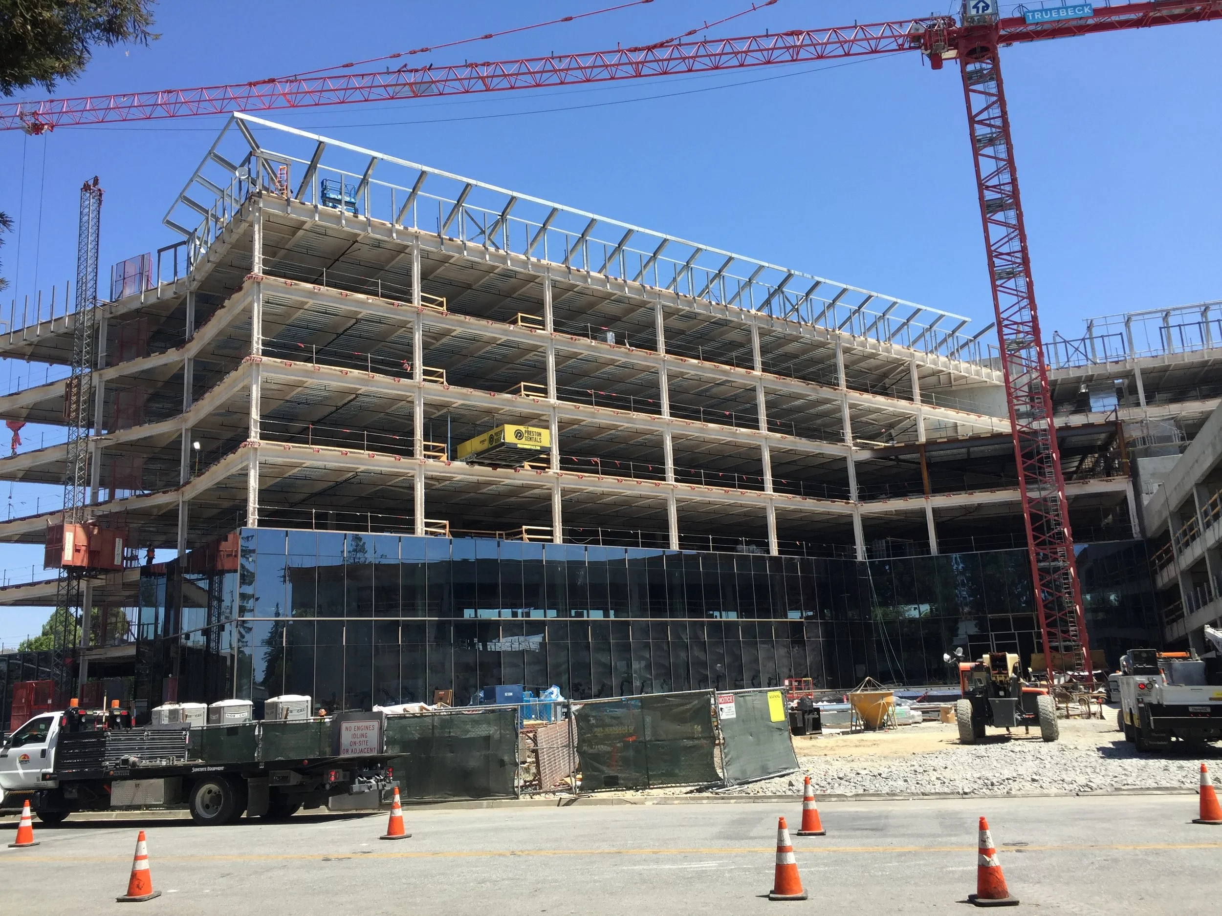 Construction of a multi-story concrete building at St. Thomas Square, where 2nd floor slab cracking was later investigated.
