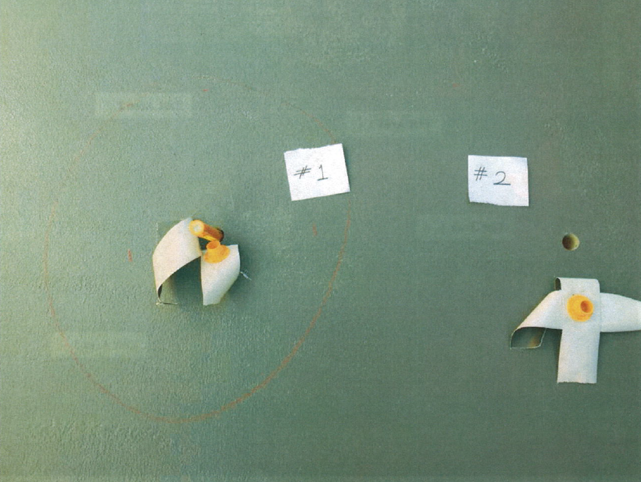 Taped and capped RH test ports on a concrete surface prepared for in-slab relative humidity measurement.