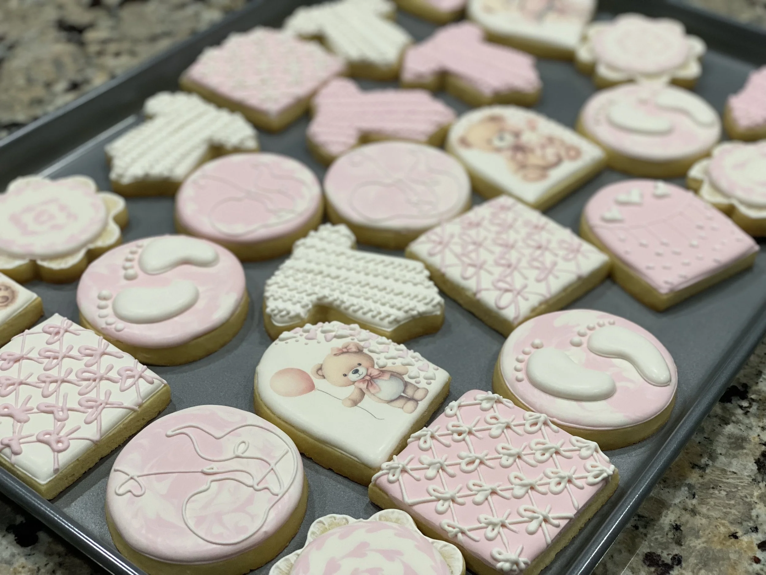 Pastel pink baby sugar cookies