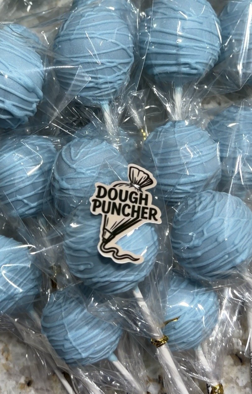 Blue cake pops with logo