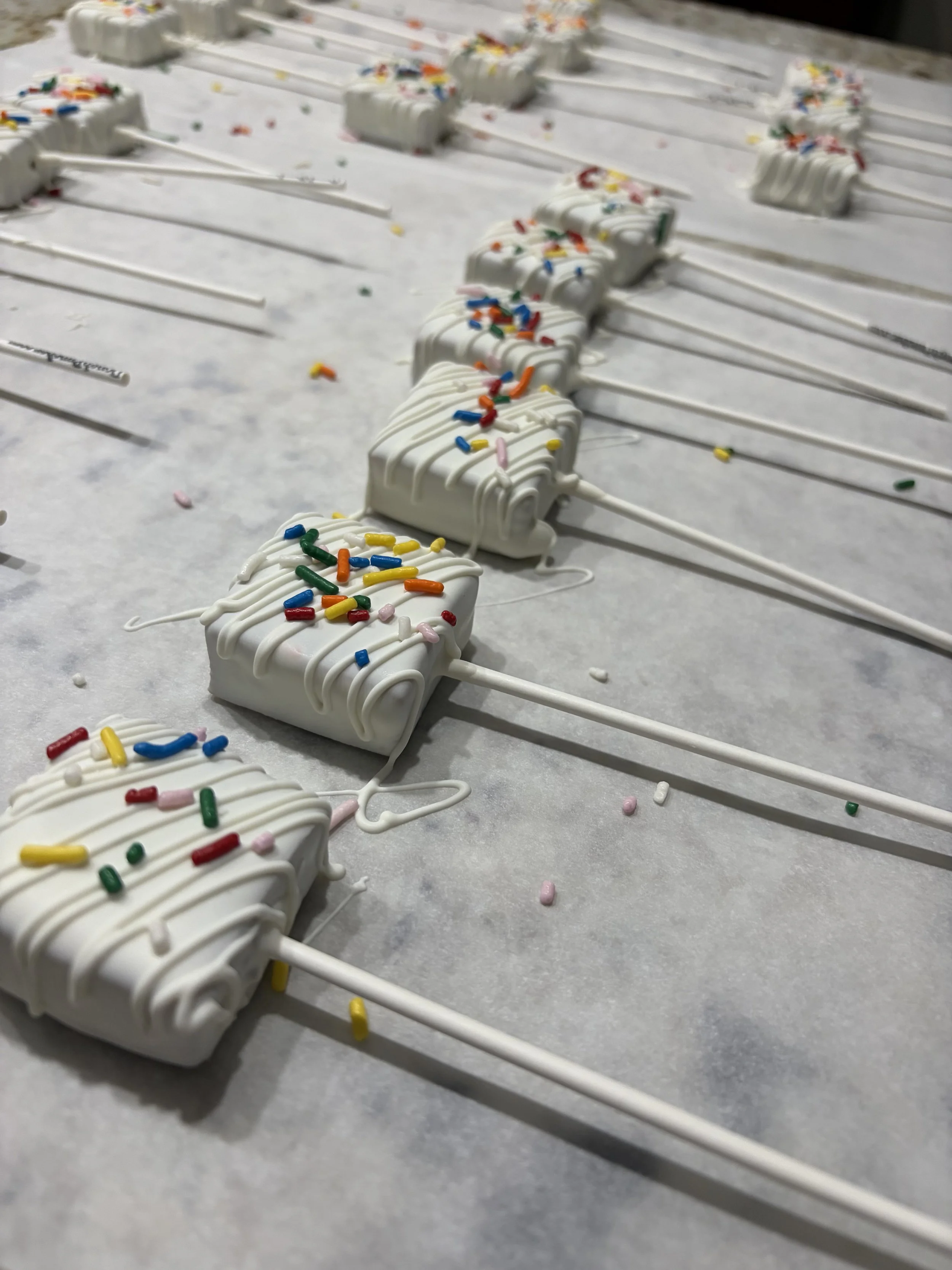 Square cake pops with sprinkles