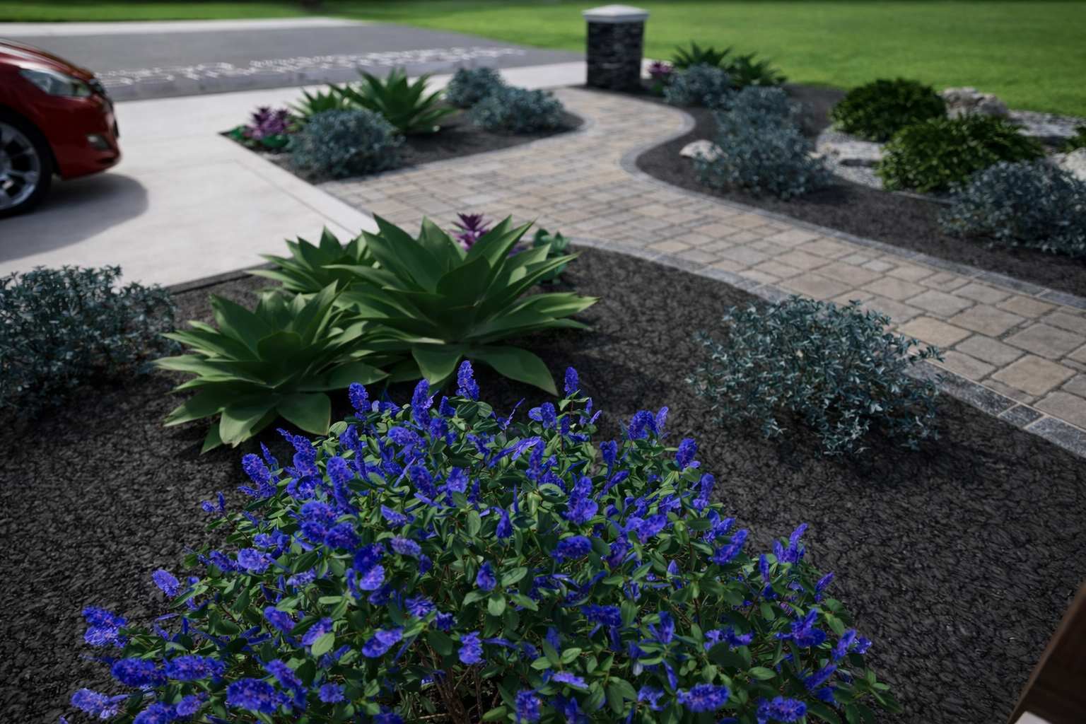 A landscaped front yard with a brick walkway, purple and blue flowering plants, green shrubs, and a parking area with a red car in the background.