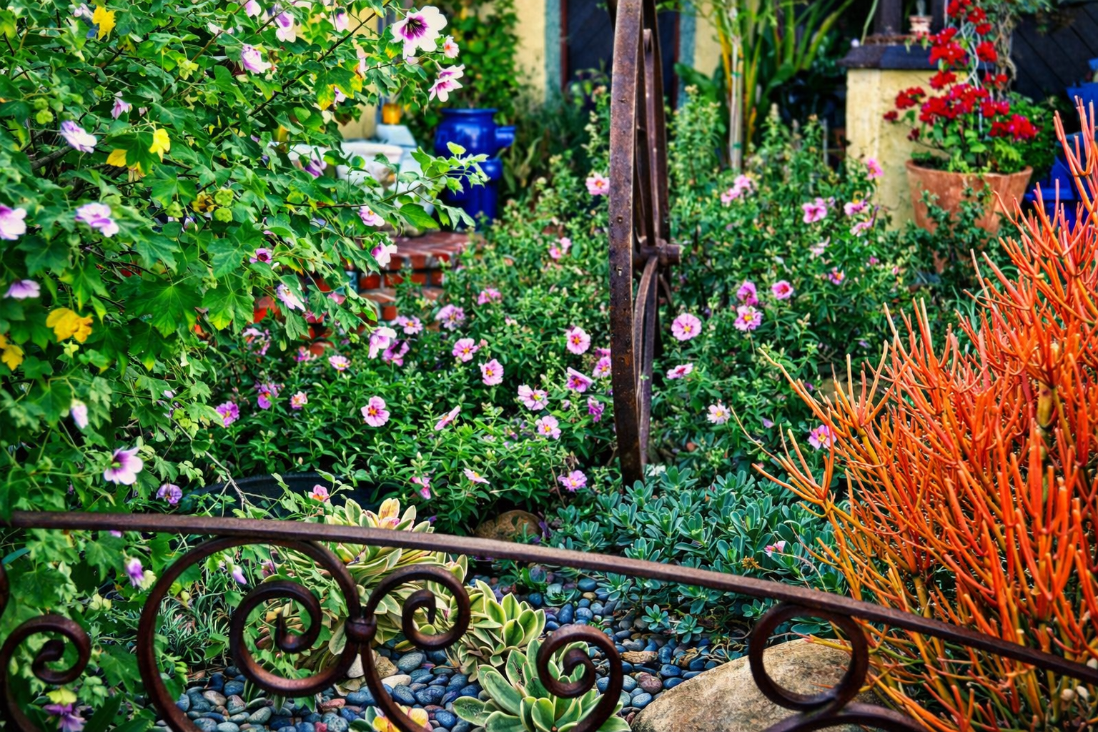 A vibrant garden with pink and purple flowers, green foliage, succulents, and potted plants, surrounded by an ornate wrought iron fence and colorful decorative elements.