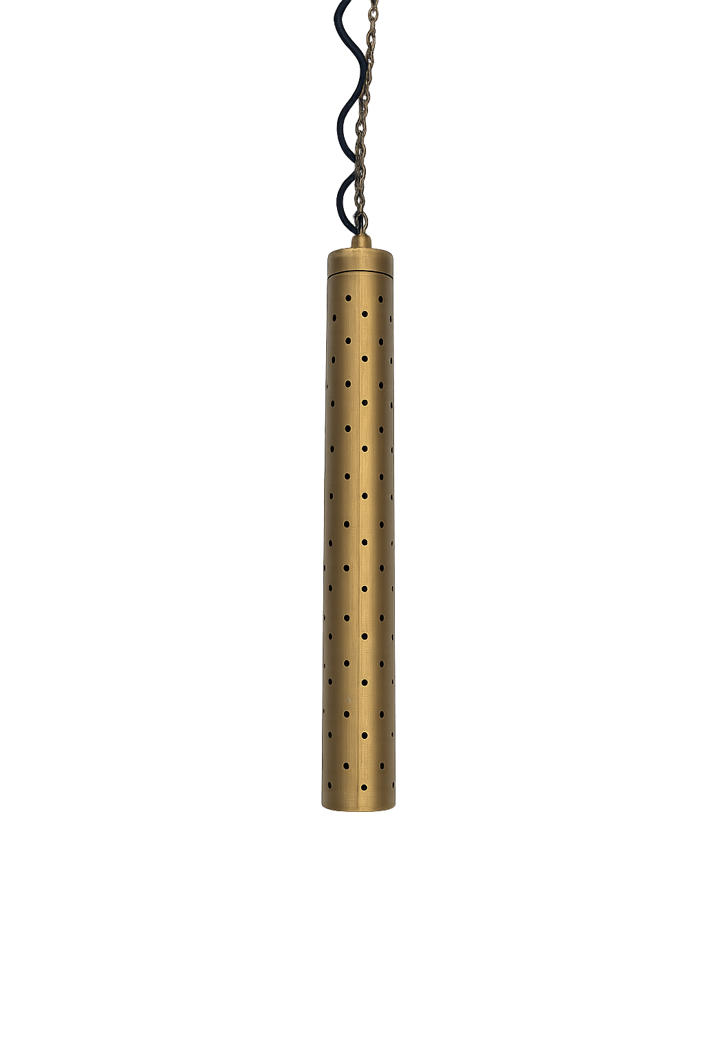 A gold-colored cylindrical object with holes, hanging by a chain from a cord, against a black background with colorful, blurred lights.