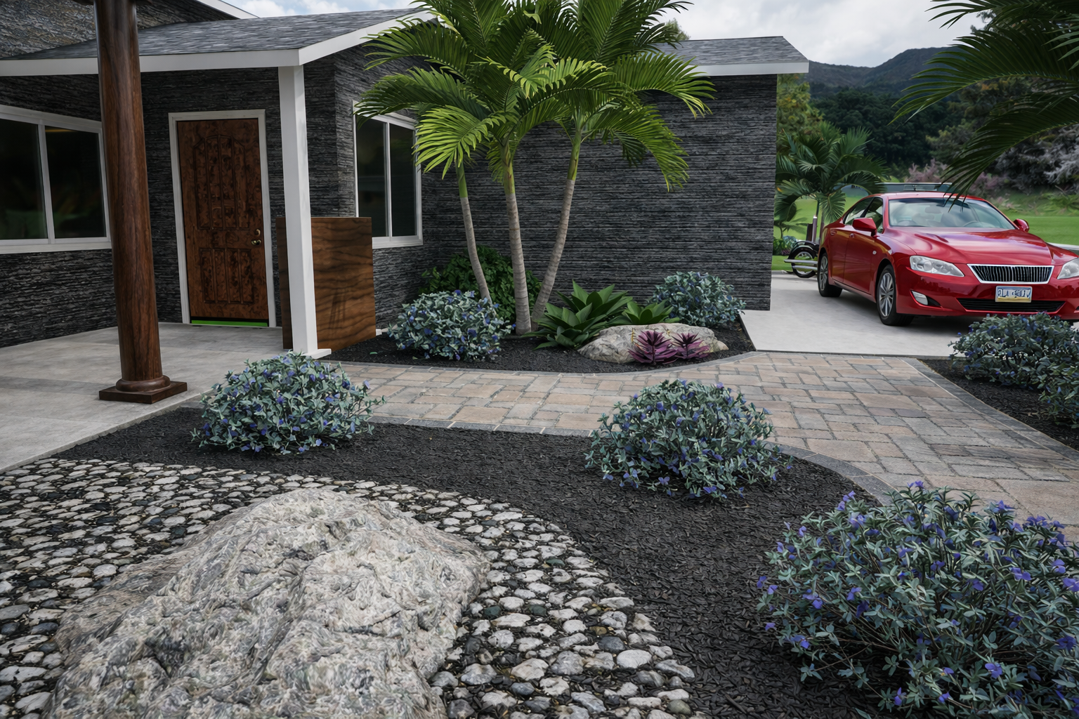 Front yard with plants, flowers, and a brick walkway leading to a house with dark exterior walls, a wooden door, tall palm trees, and a red car parked on the driveway.