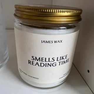 White candle smells like reading time. 8 oz