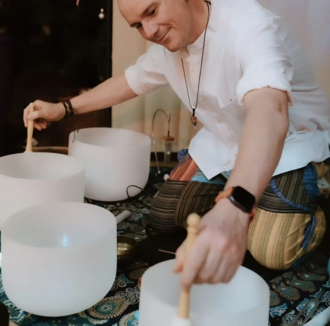 Paul playing the crystal bowls.jpeg