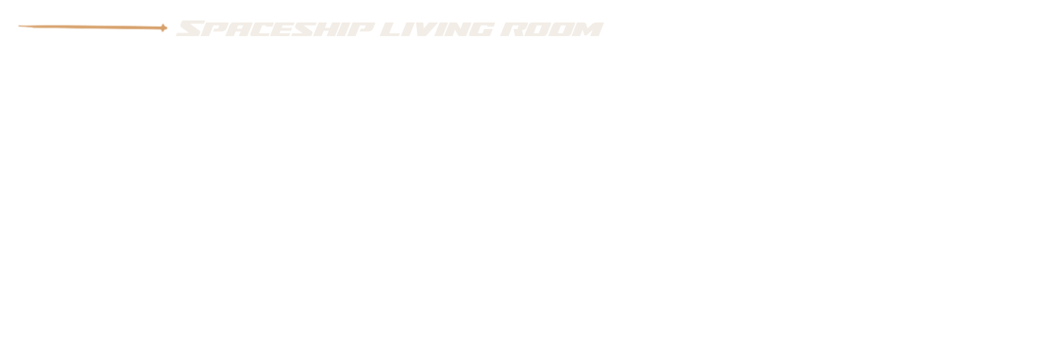 A sign with the words 'Spaceland Living Room' in a futuristic font, featuring a small arrow pointing to the left and a star symbol.