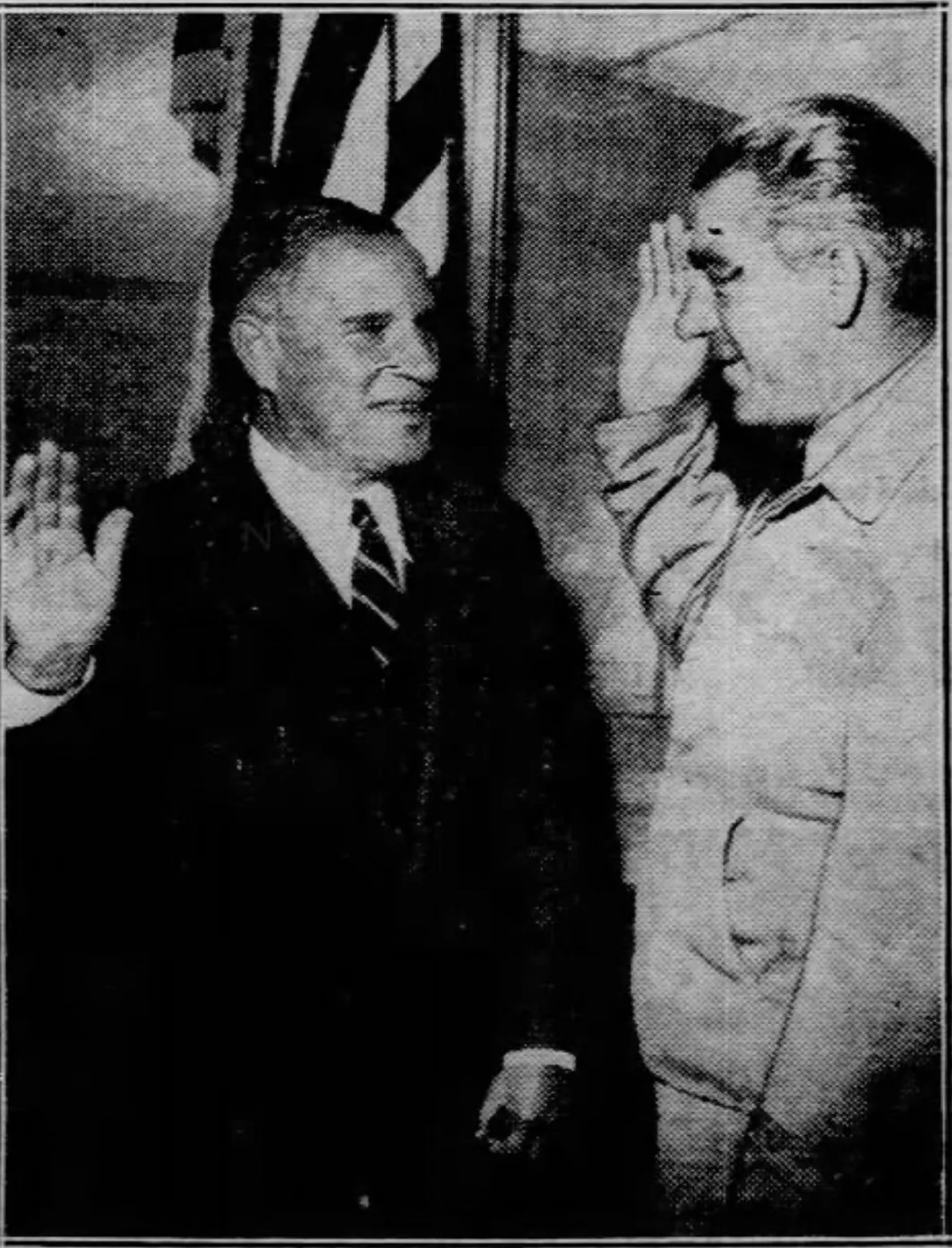 Anthony Hanzlik being sworn in to the Clayton Knight Committee by borough president Harvey in 1941