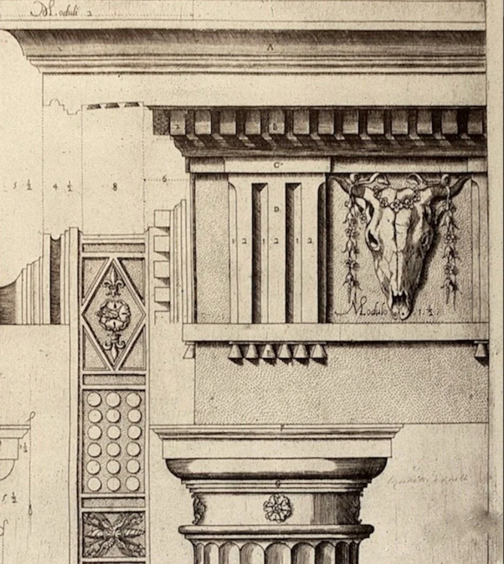 The classical ornament preserves an older architectural language of ritual and civic gravity