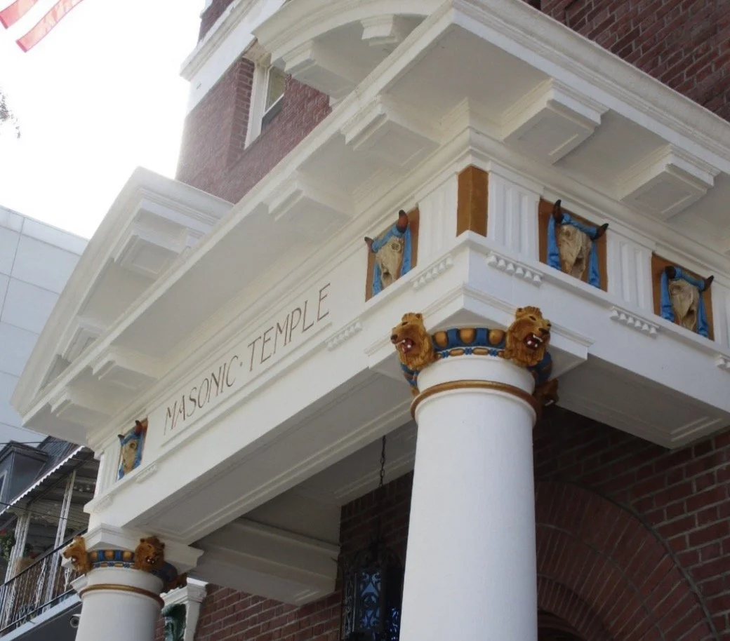 A picture of the lions on the architrave of the Advance Masonic Temple