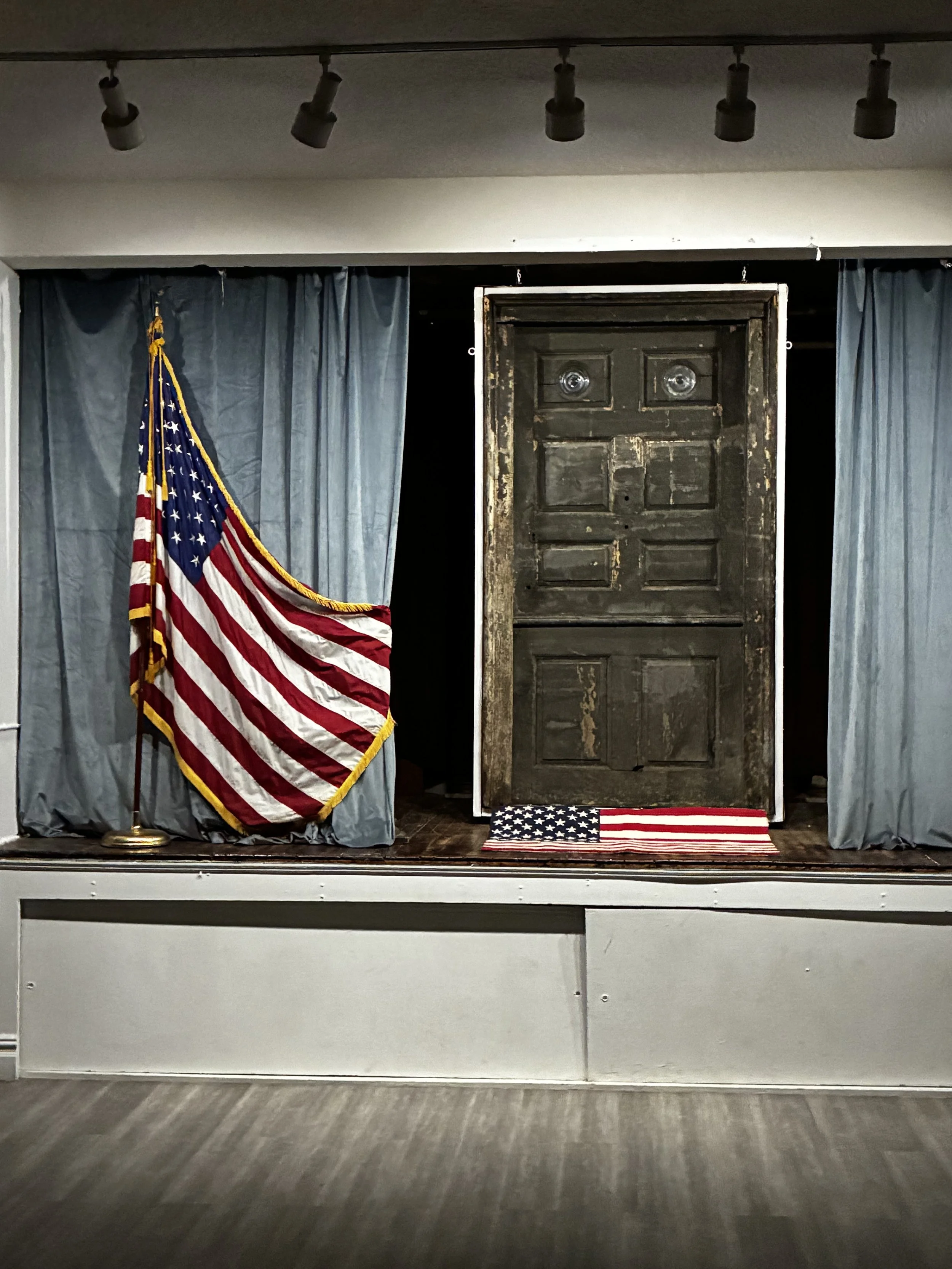 The Jacob Blackwell Door hanging  on display at the Advance Masonic Temple.