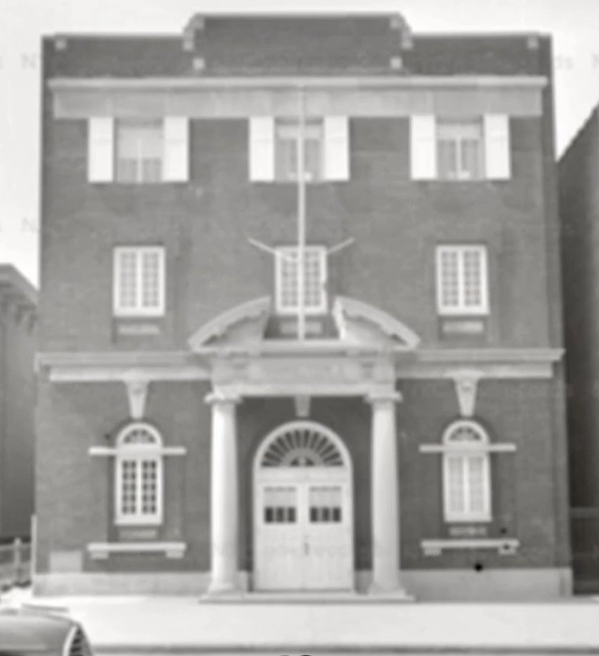 An old Masonic lodge building in Astoria, Queens, with historical significance and classic masonry architecture, representing the rich legacy of Advance Service Mizpah Lodge No. 586.