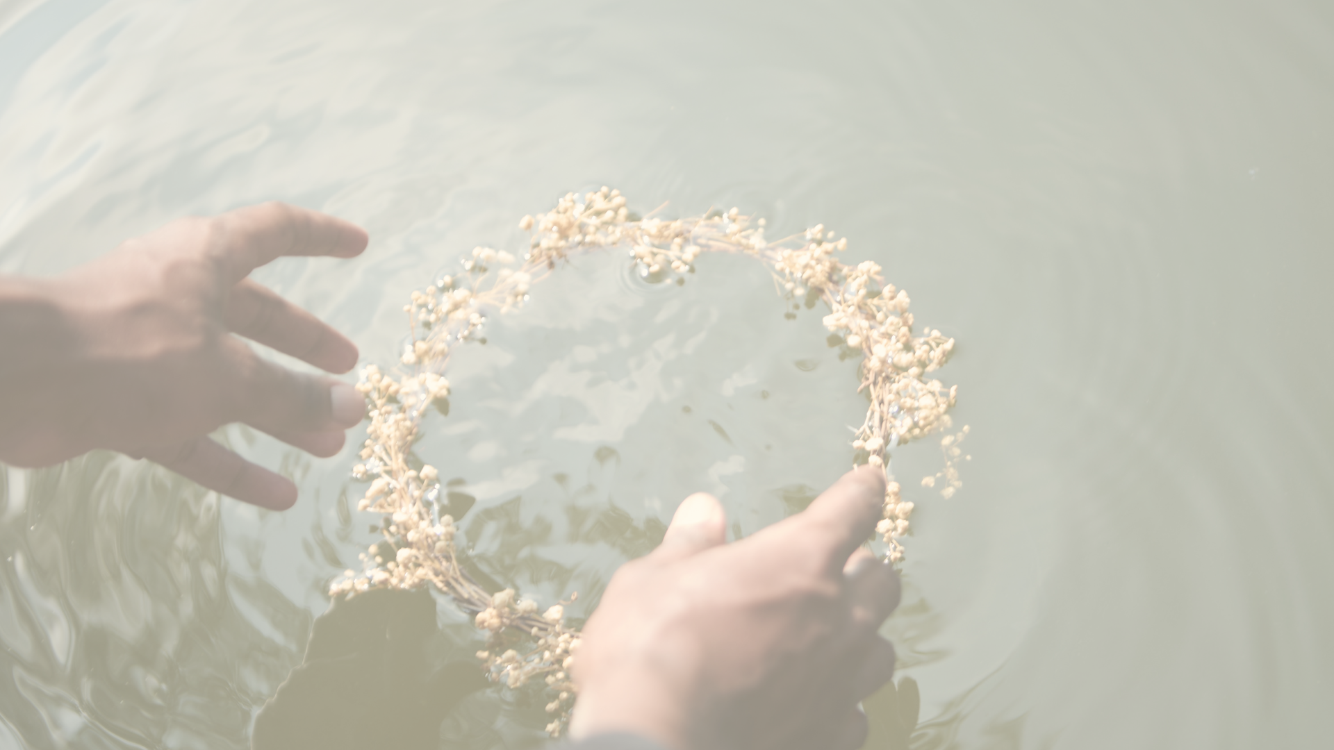 Hands in the water representing  Grief Support & Mentoring with Thryn Young of Divinity Within.