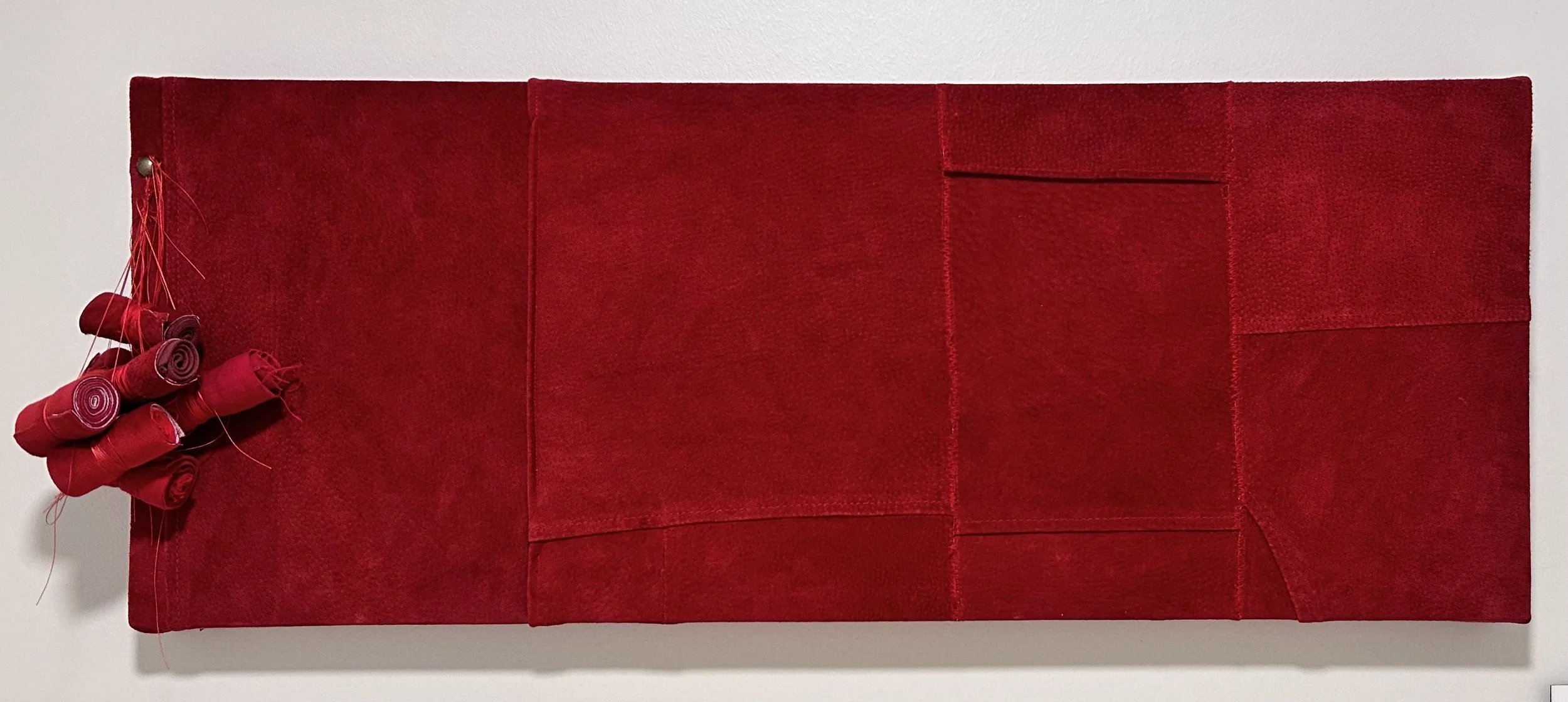 Black cat supercharged.
Suede, thread.
10 in x 24 in x 5 in; 2024.