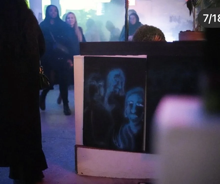 A dark painting of human faces with glowing effects, set at an indoor event where people are socializing and walking, illuminated by colorful dim lighting.