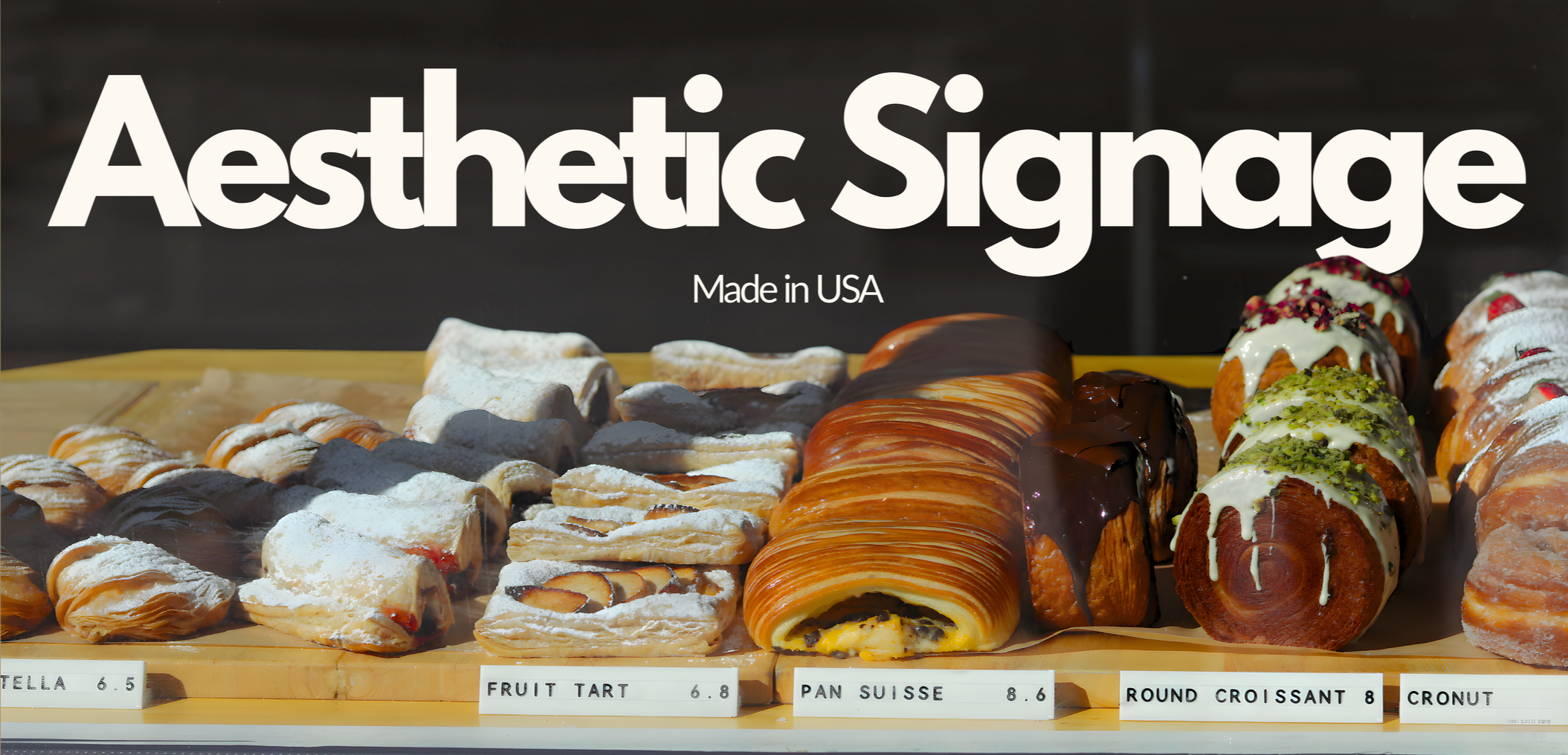 aesthetic modular signage displayed with pastries for bakery and cafe displays, made in USA retail signage system