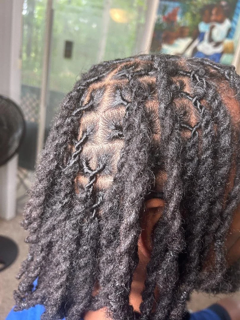 Loc Retwist w/ 2 strand twist style.
