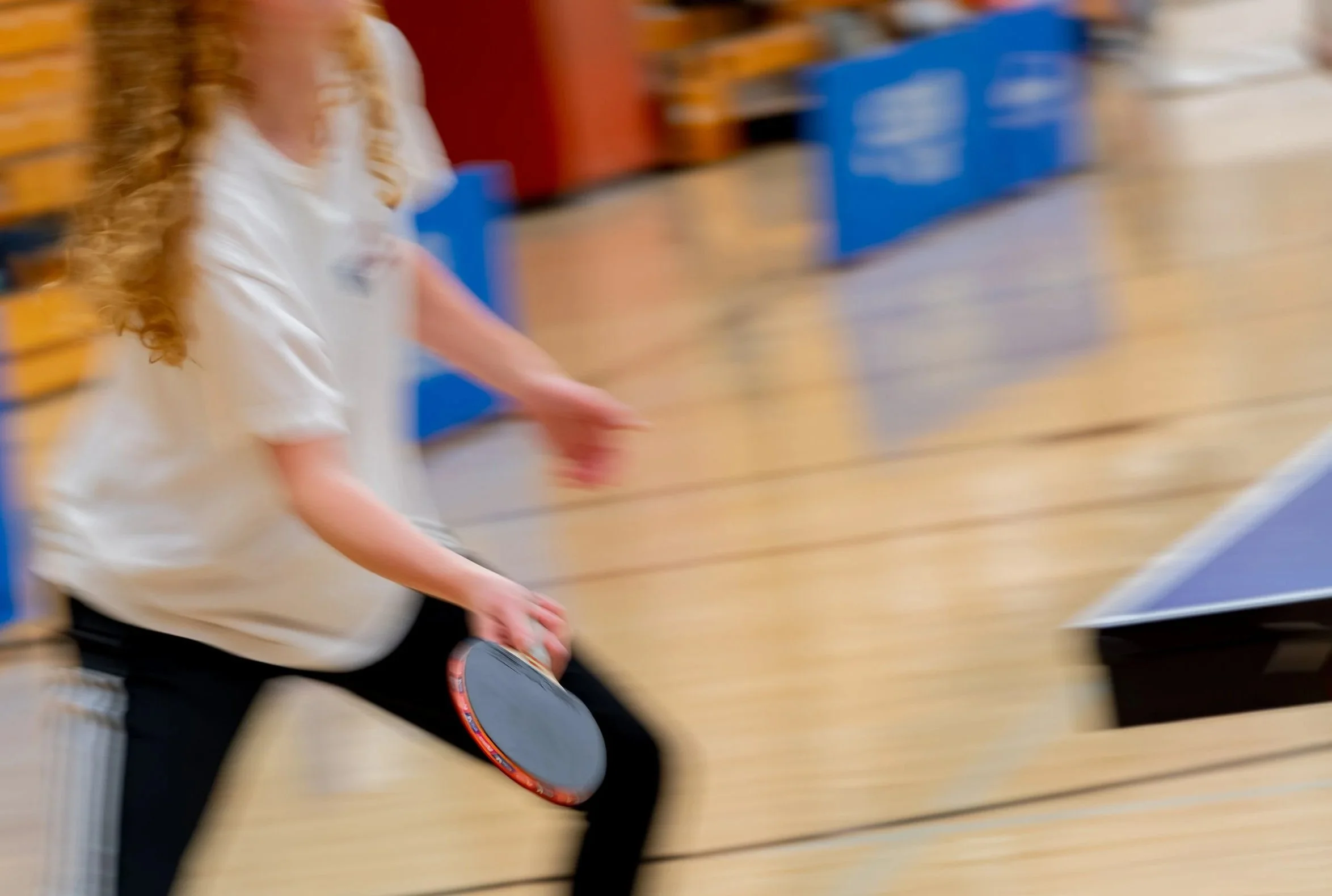 Table tennis player prepares to hit ball at Recsports' Intramural Table Tennis Singles Tournament on Dec. 3, 2025. 