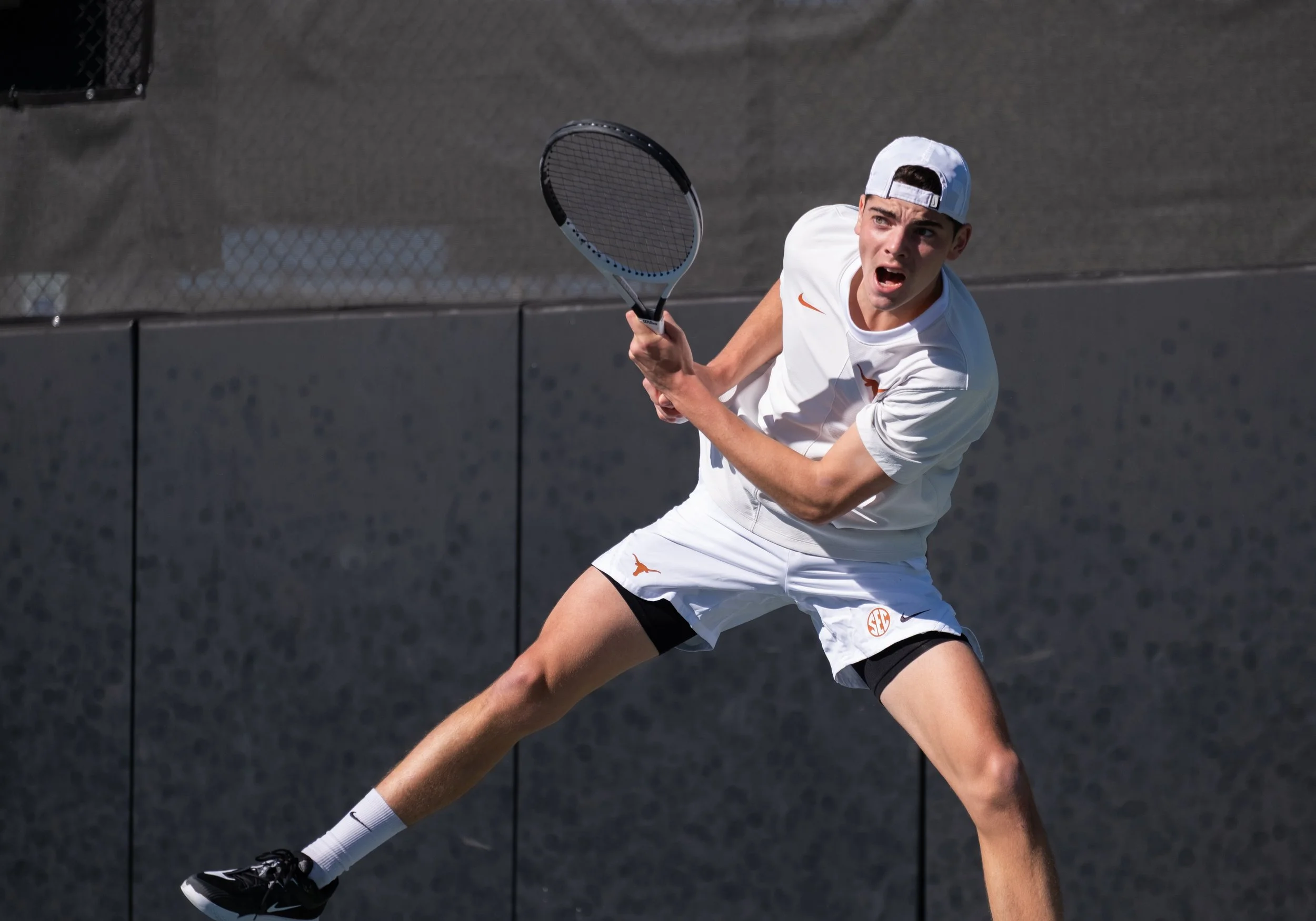 Freshman Lucas Marionneau during a singles match against Virginia on Sunday, Jan. 18.