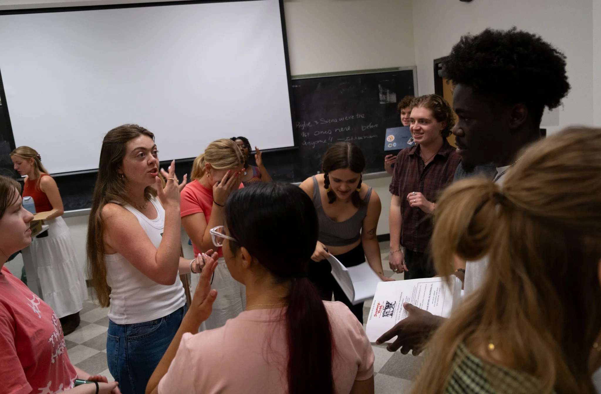 Members of the ensemble prep for rehearsal on Oct. 8 at Parlin Hall.