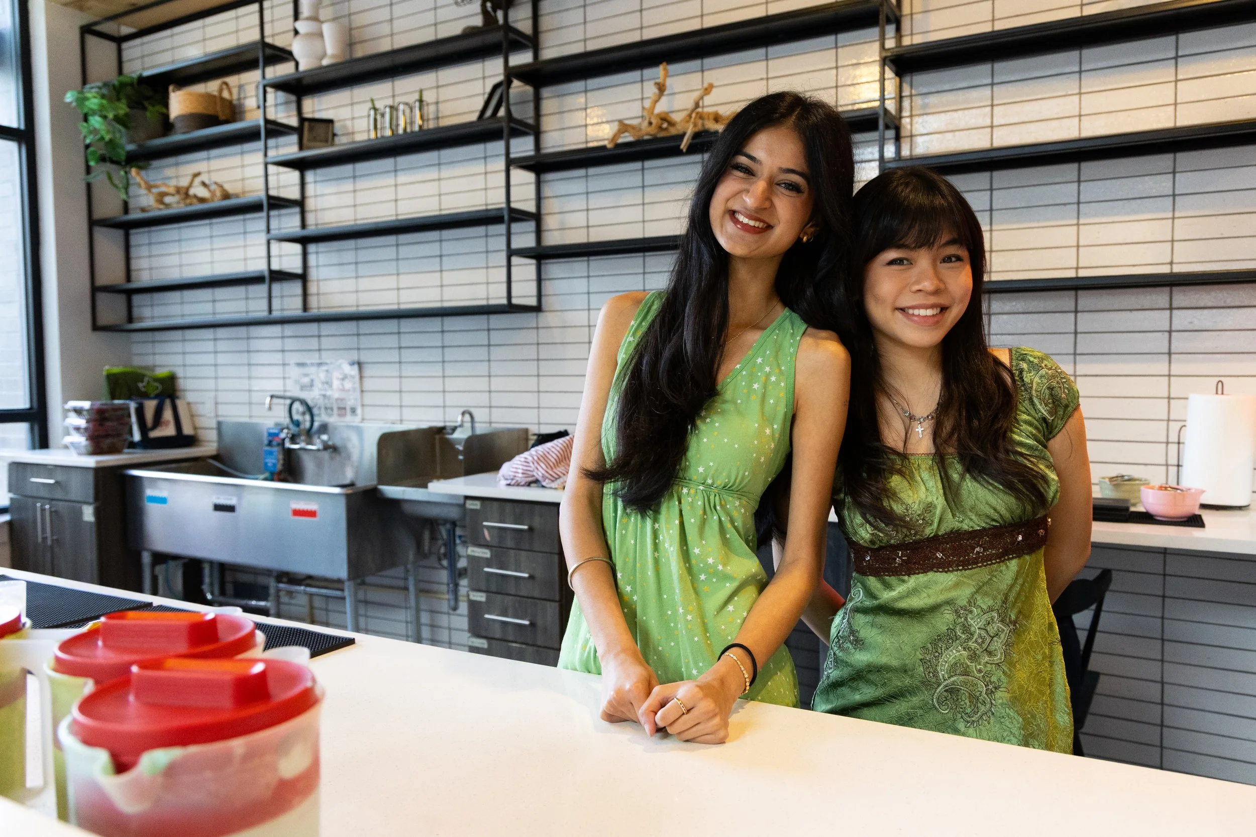 Tarnoor Kaur, left, and Linda Nguyen pose for a portrait before their Chai & Cha pop-up at Yugo Austin Rio on March 11, 2026.