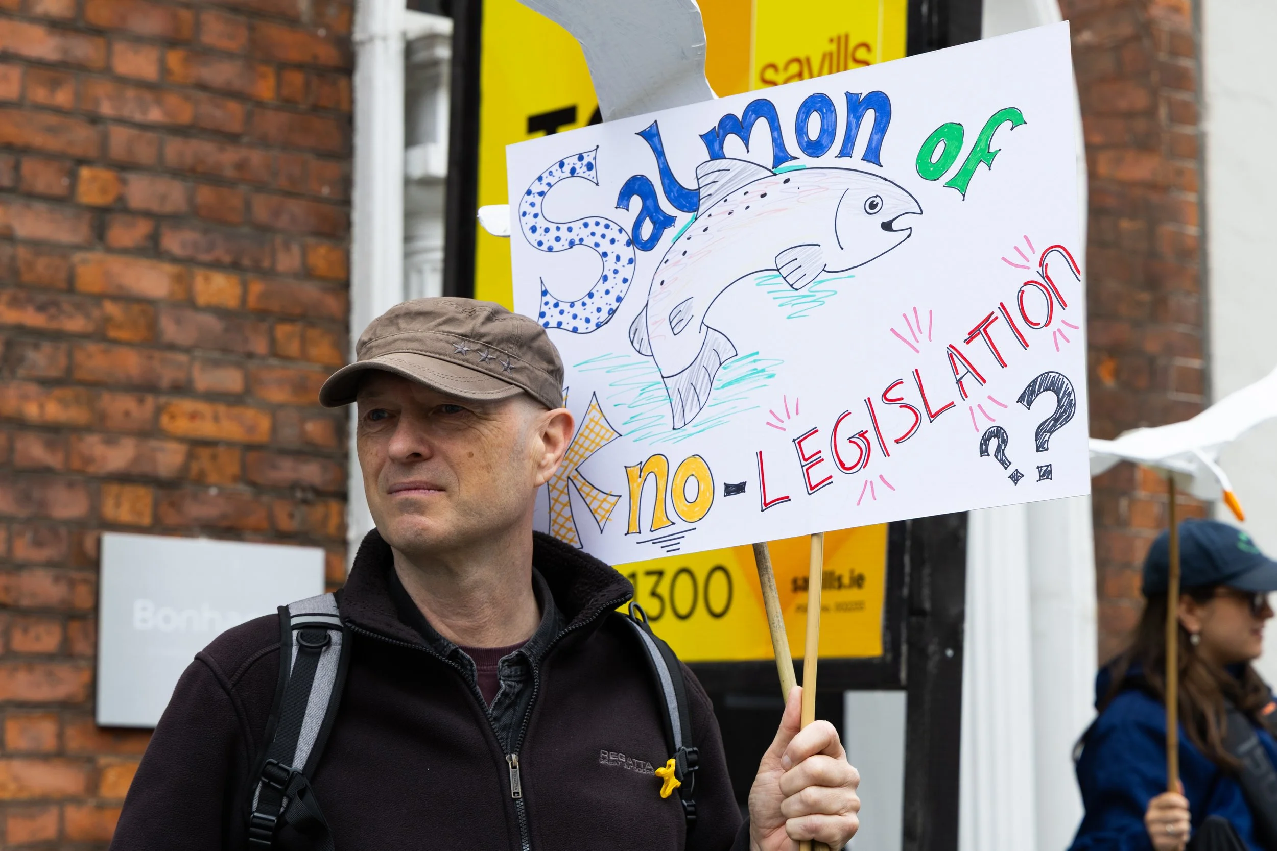 Protester holds up sign at the Rally 4 Ireland Seas in Dublin, Ireland on May 21, 2026.