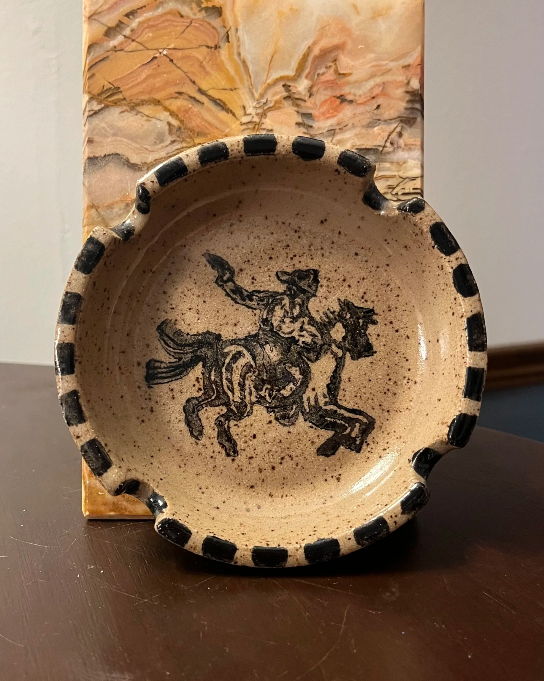 Shoot-out cowboy ashtray