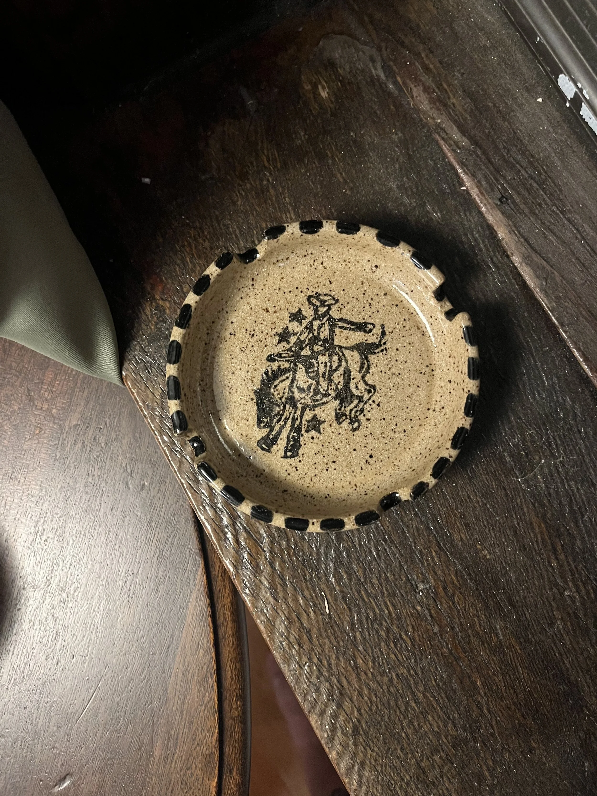Bucking cowboy ashtray