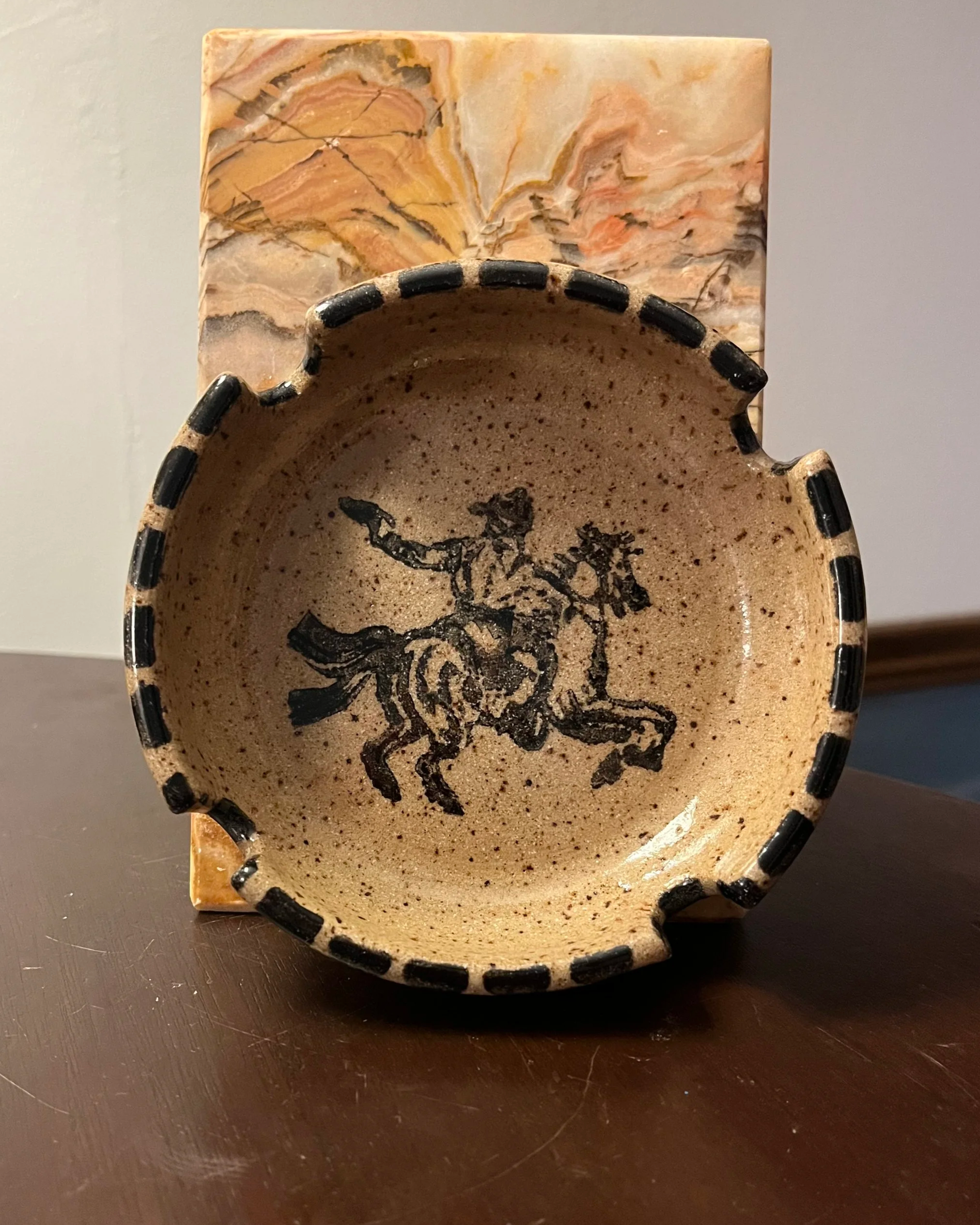 Shoot-out cowboy ashtray