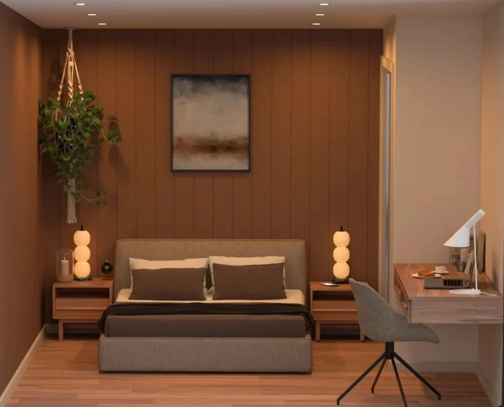 Modern bedroom with a bed flanked by two nightstands with lamps, a wall-mounted painting, a hanging plant, and a desk with a chair and a desk lamp.