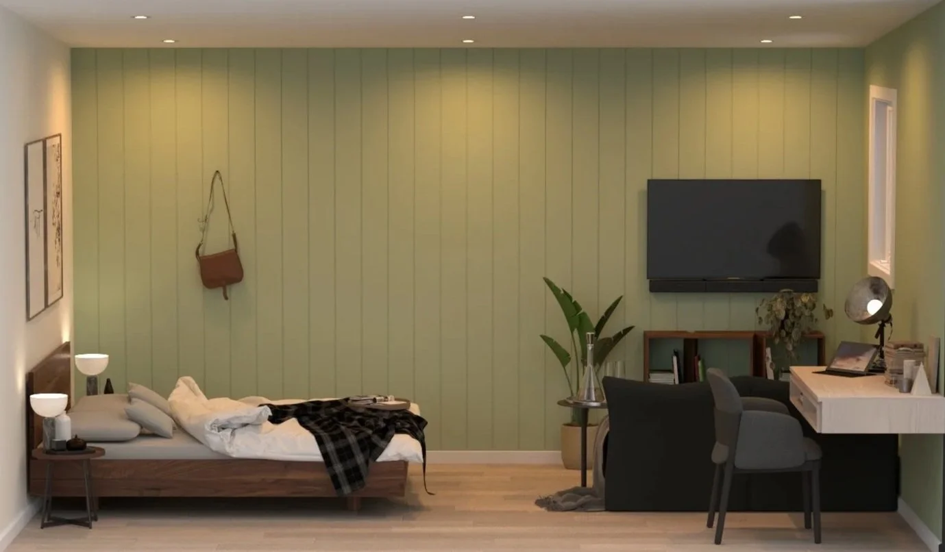 A bedroom with a bed, two side tables with lamps, a brown purse hanging on a wall, a large plant, a mounted TV, a desk with a lamp, books, and a chair.