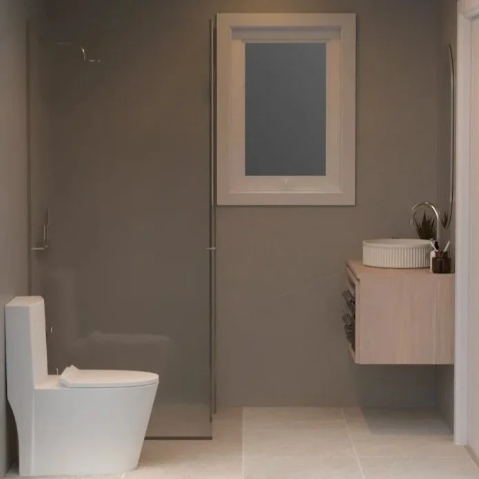 Modern bathroom with a white toilet, a glass shower enclosure, a wooden vanity with a round mirror, and a small window.