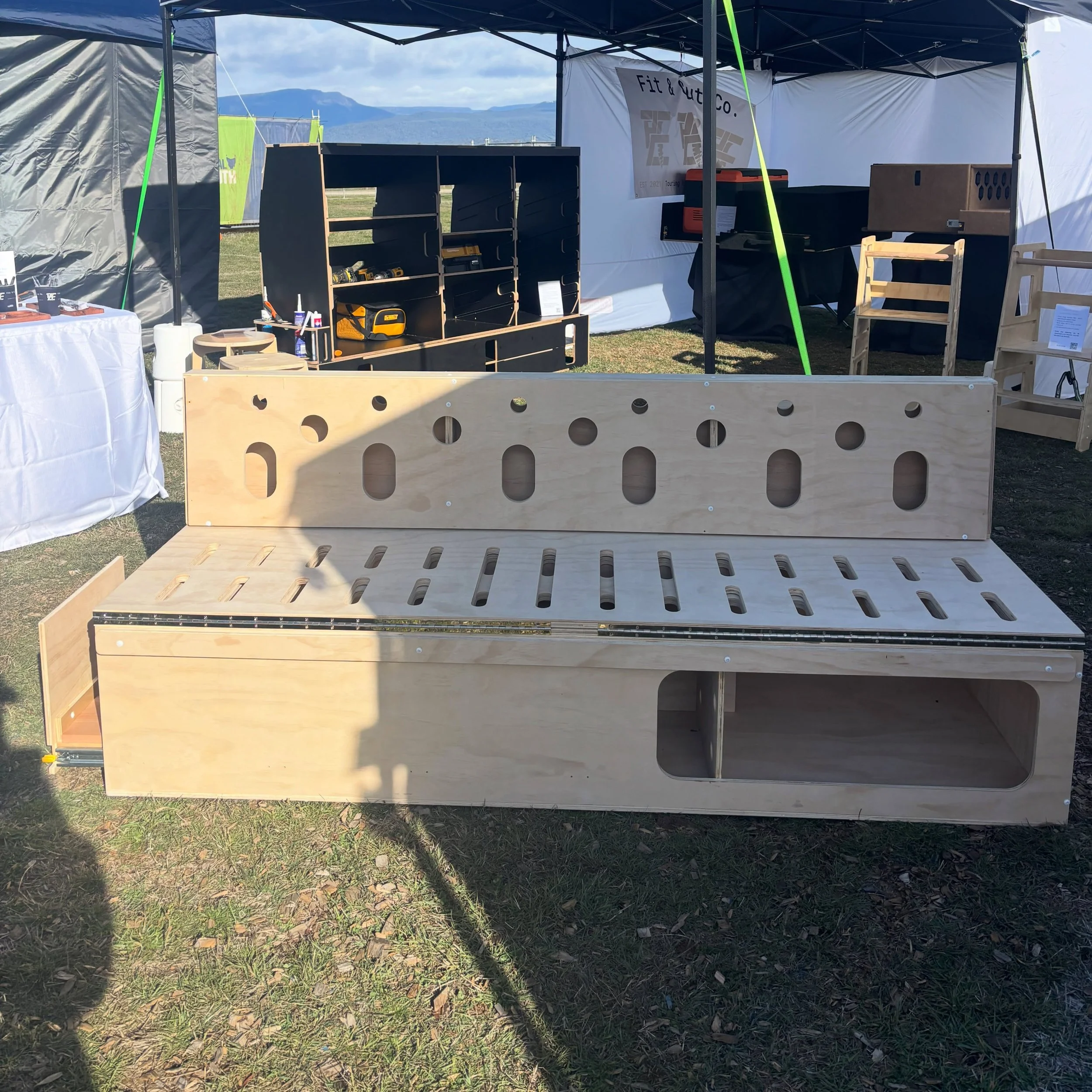 Custom removable VAN FITOUT. 🚐

Heavy duty draw with cooker surface and storage. Bed length of approx. double bed. Folds from chair to bed weighing approx 70-80kgs. 

Timber can be customised. And bed can be made to slide instead of fold. 

Made to 