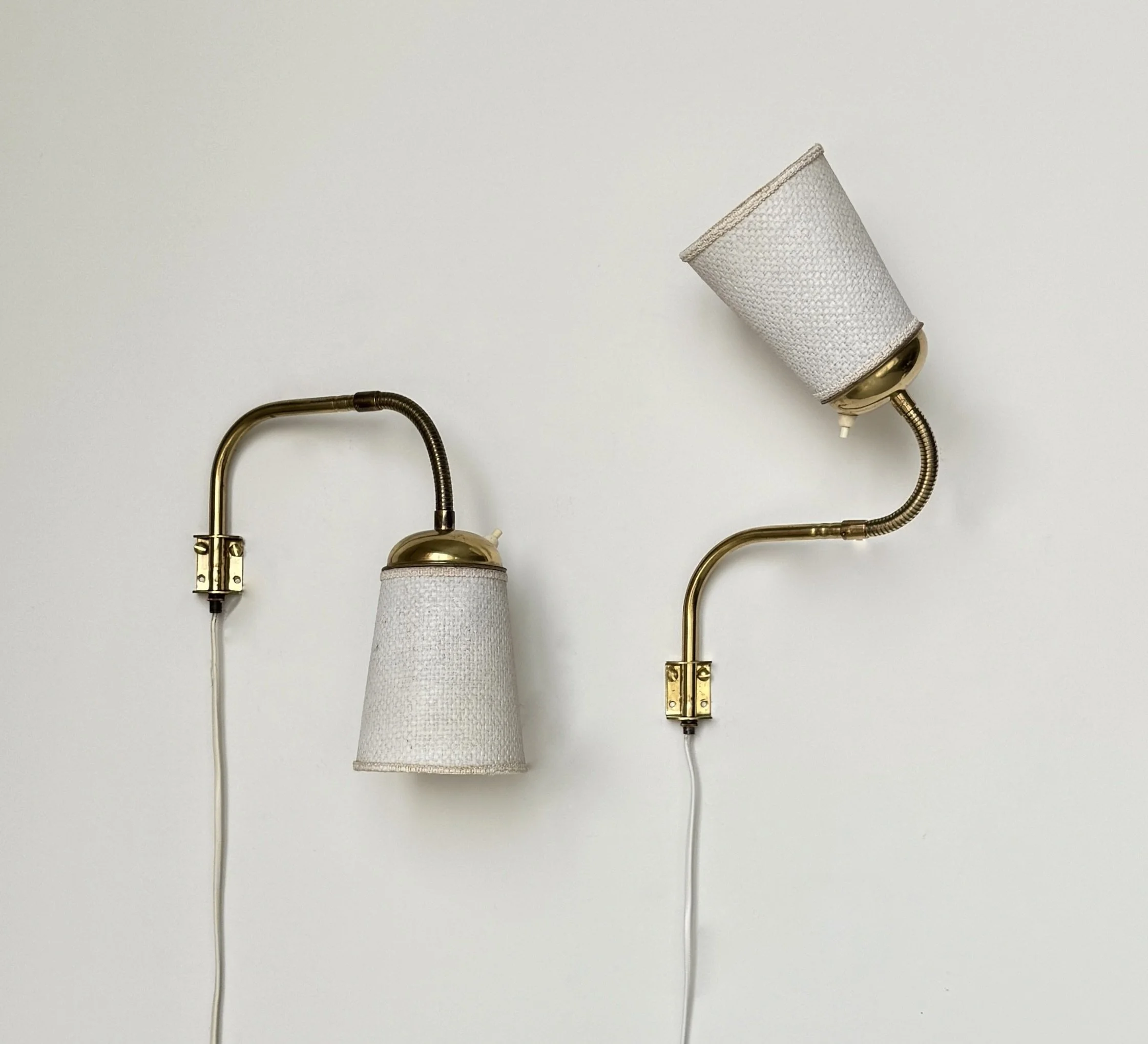 Attributed to ASEA, pair of adjustable wall lamps, 1950s