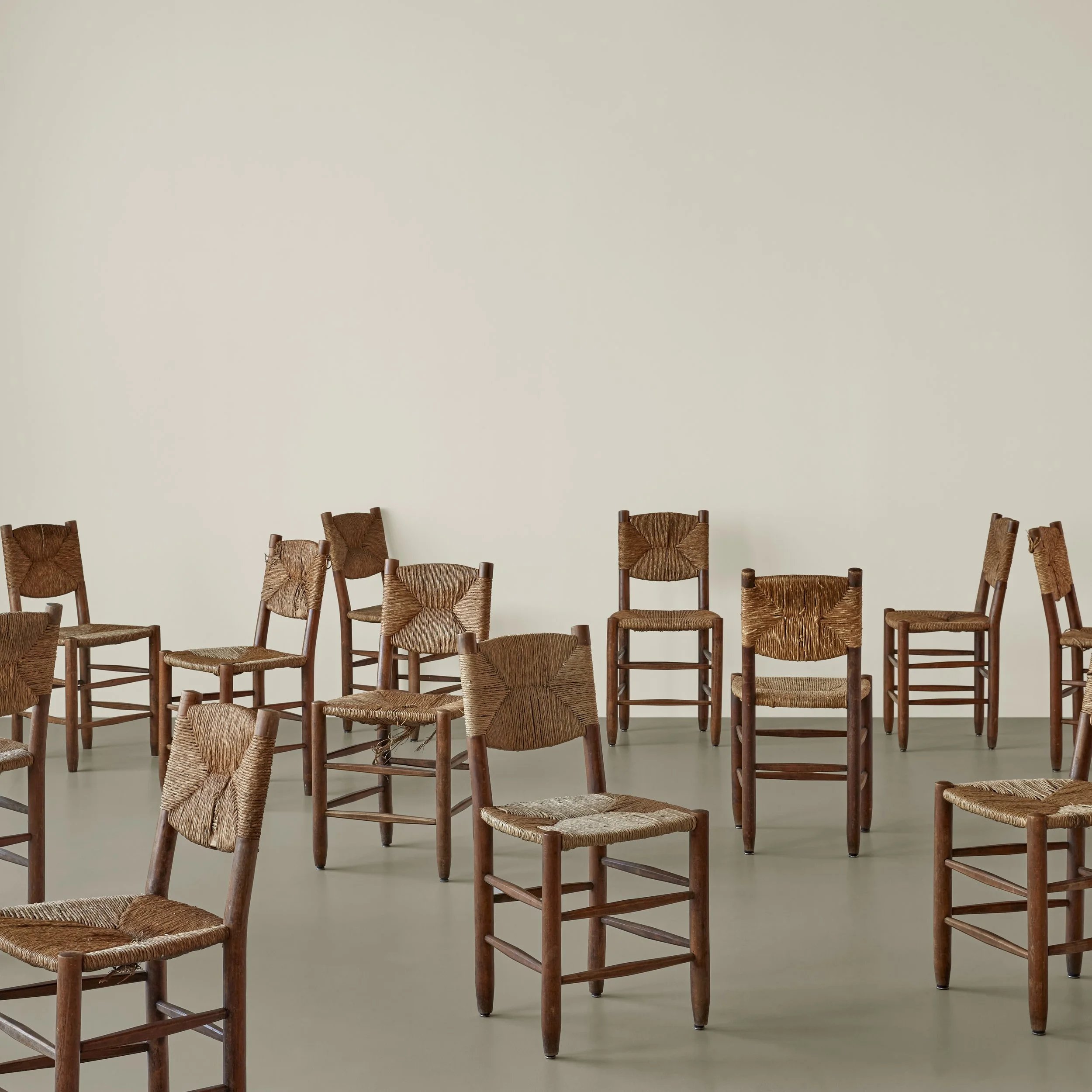 Charlotte Perriand, set of twelve "Bauche" chairs, model no. 19, 1950s