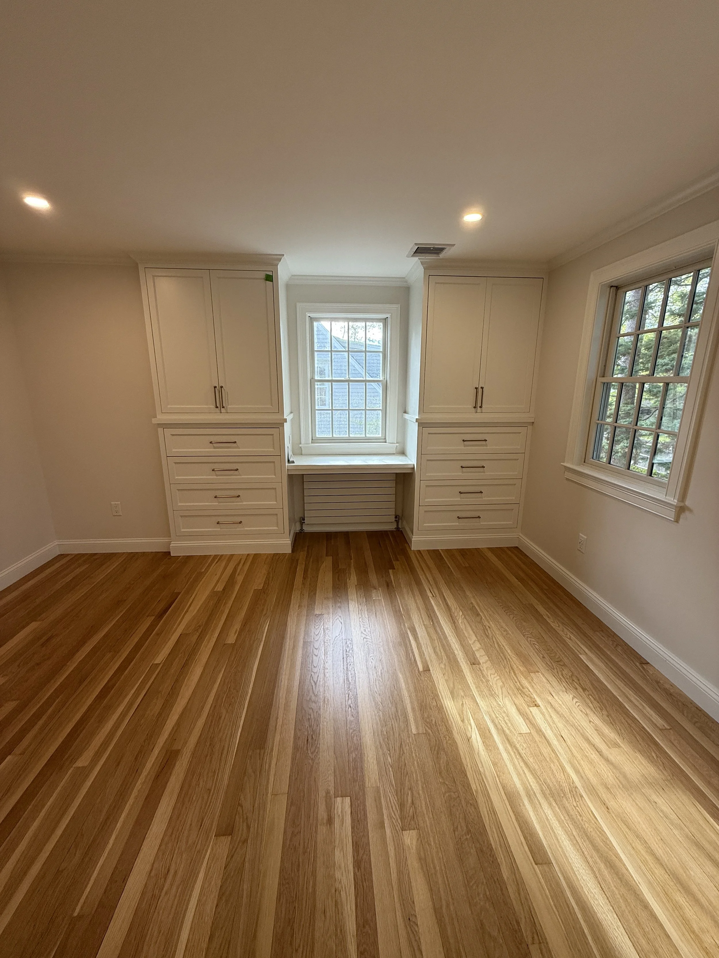 Why We Install Baseboard Before Hardwood Flooring — And Why the Painters Are the Last Trade to Leave