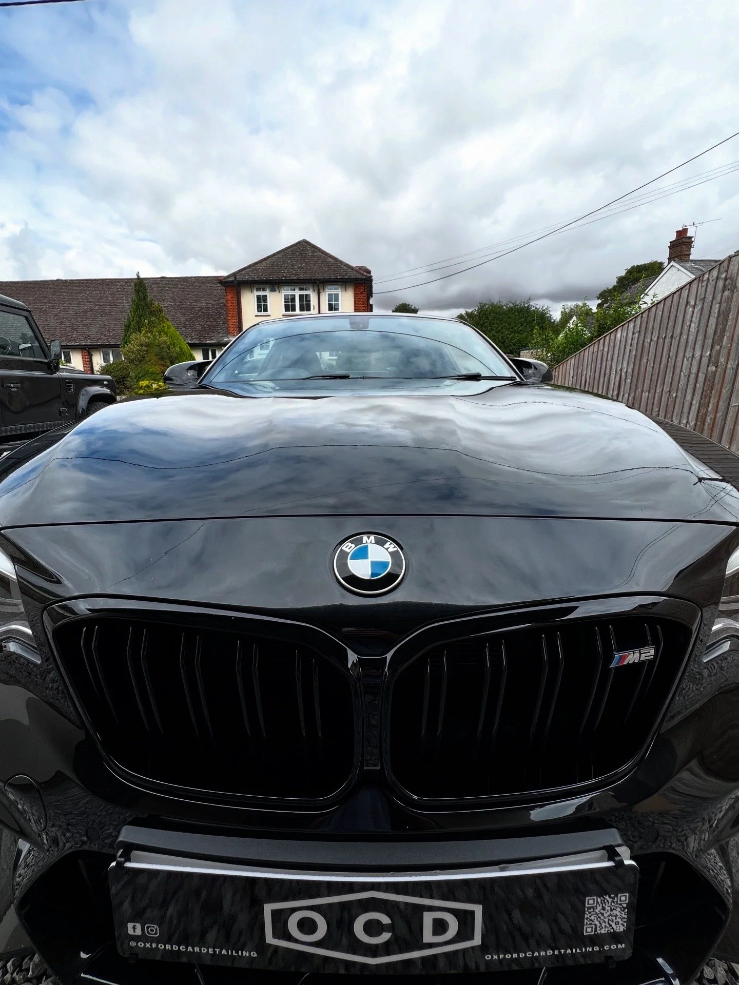 Black BMW M2 sports car after Oxford Car Detailing mobile valet treatment.