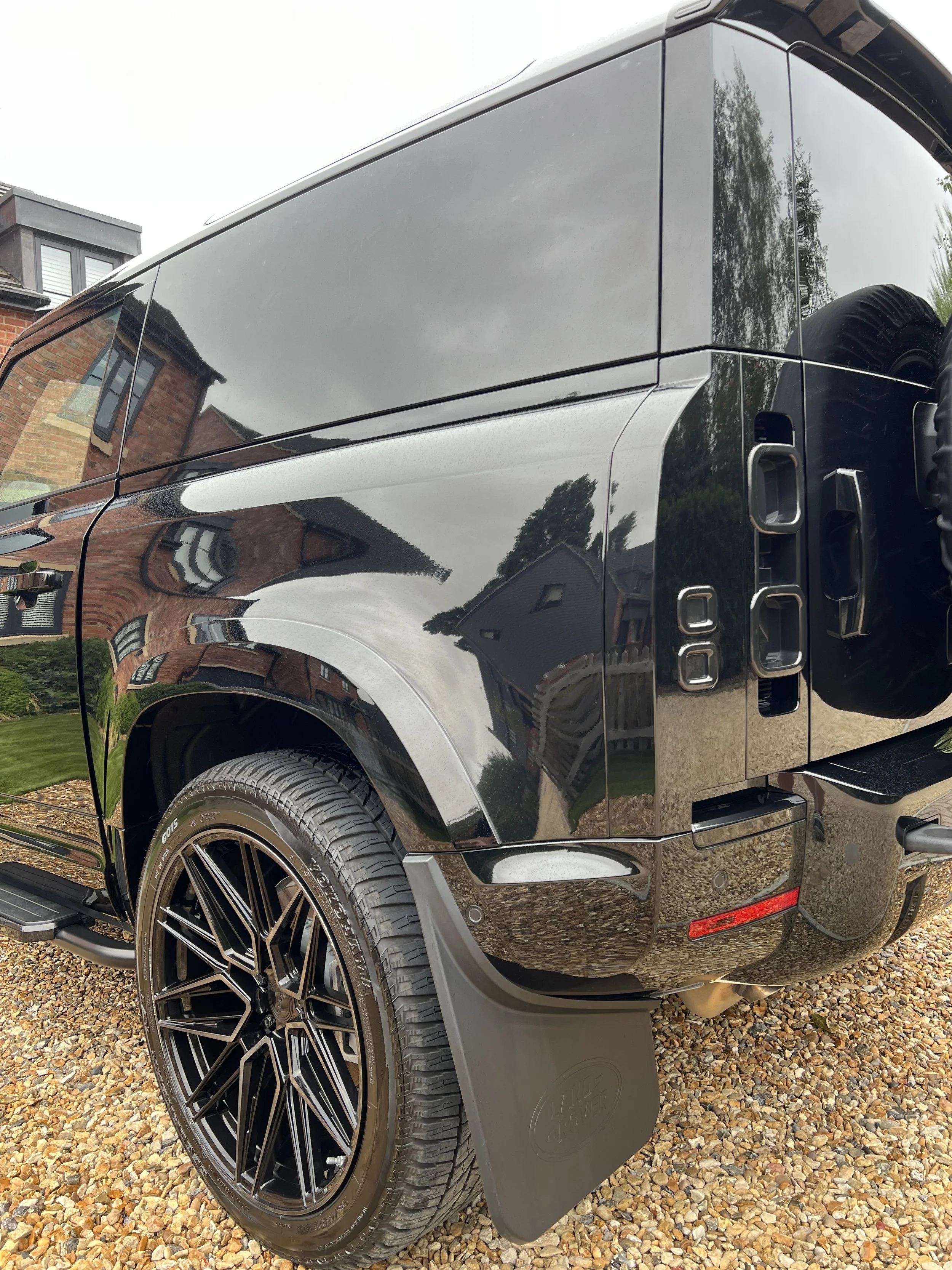 Black luxury SUV after OCD car valet and detailing package.