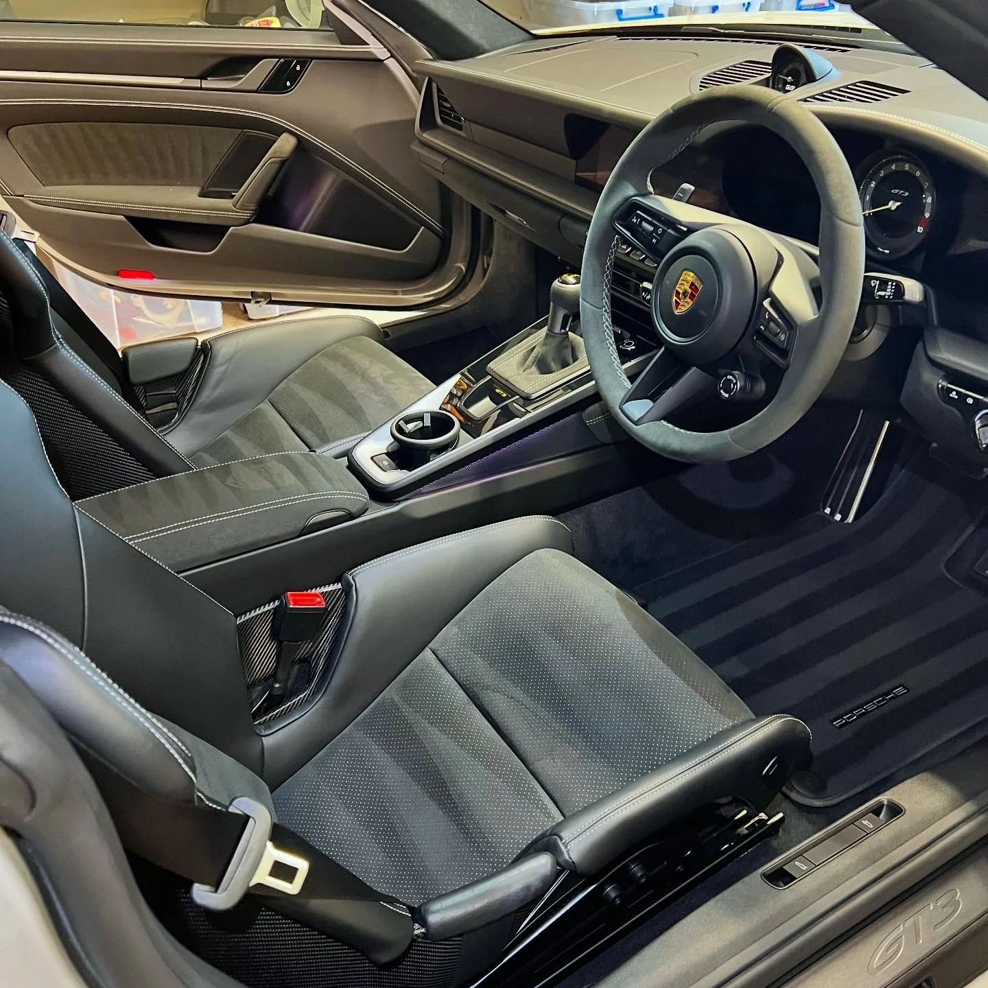 Interior of a Porsche car after a full detail valet by Oxford Car Detailing.