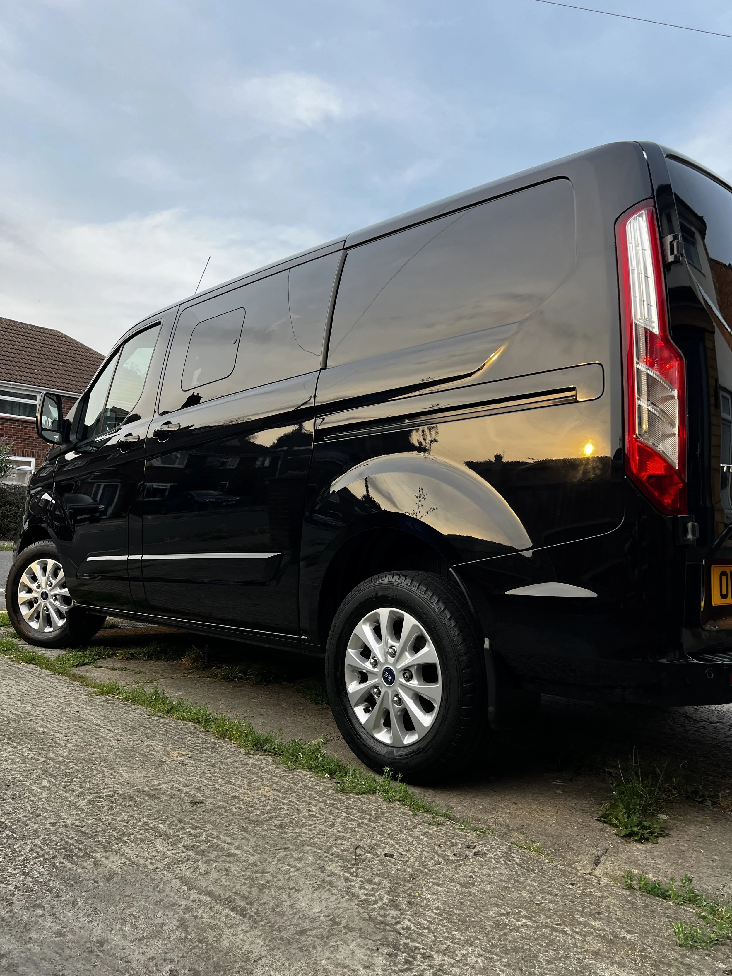 Black van after a full detail valet by Oxford Car Detailing.