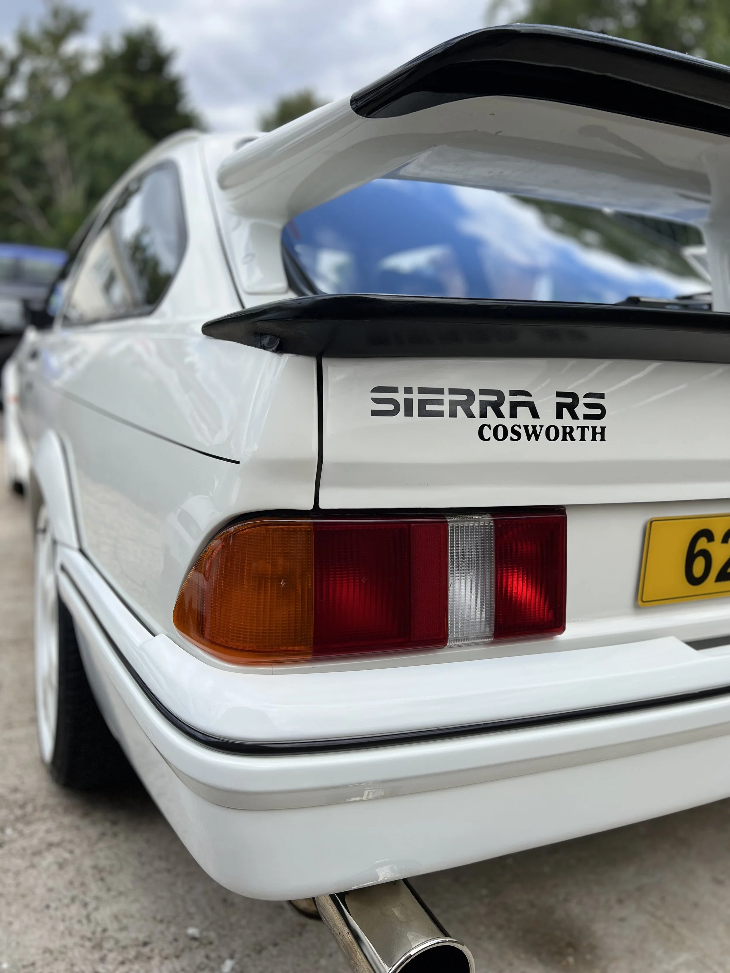 Close-up of the rear of a white Subaru Sierra RS Cosworth after OCD car valet and detailing package.
