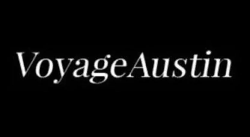 Black background with white text reading "VoyageAustin."