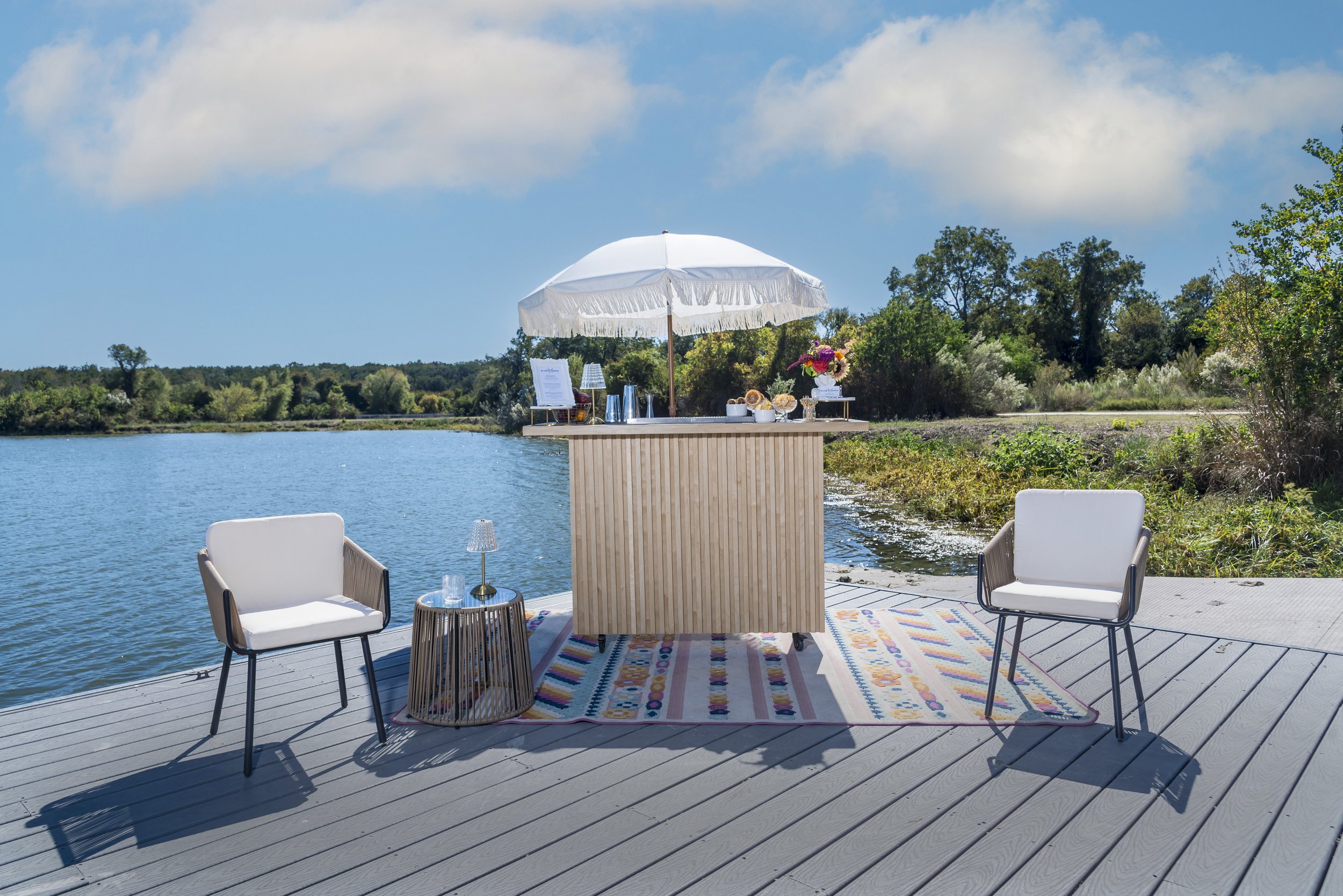 Social Butterfly ATX mobile bar setup for a backyard wedding in Austin.