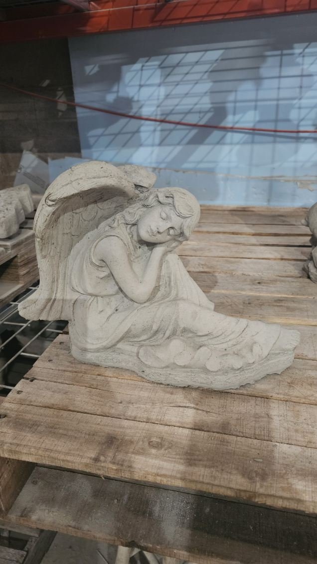 SA139 ANGEL WITH HEAD ON KNEE 12" $48