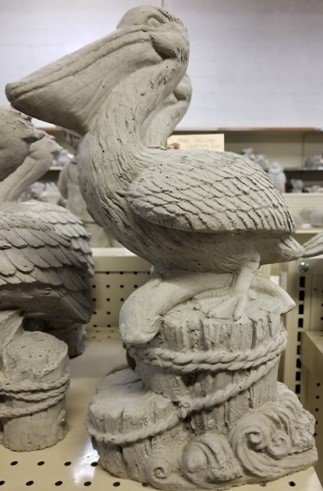 AP694 PELICAN MEDIUM HOLDING FISH $30